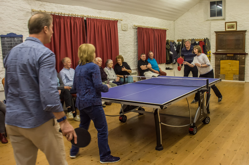 people playing table tennis